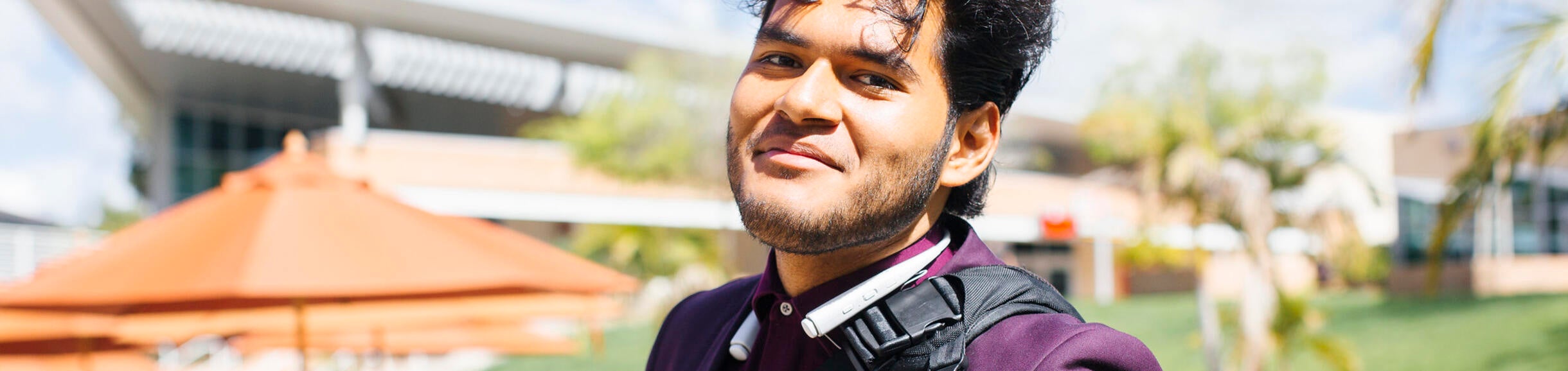 Student in Purple Suit