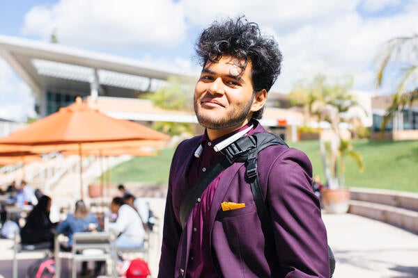 Student in Purple Suit